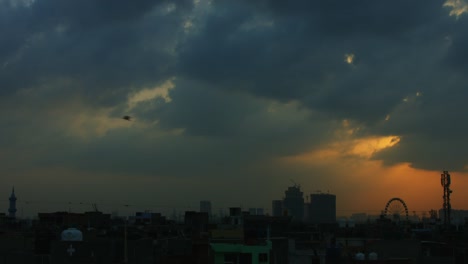 Time-lapse-shot-of-cityscape-at-sunrise,-Delhi,-India