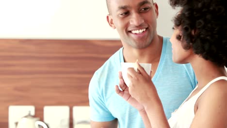 Smiling-couple-having-breakfast-together