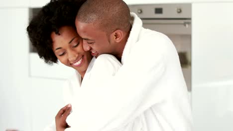 Romantic-smiling-couple-taking-breakfast-together