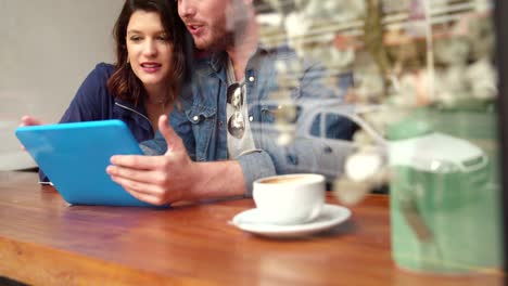 Woman-and-Man-sitting-coffee-shop-in-Cafe