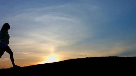 Silhouette-of-a-young-couple.