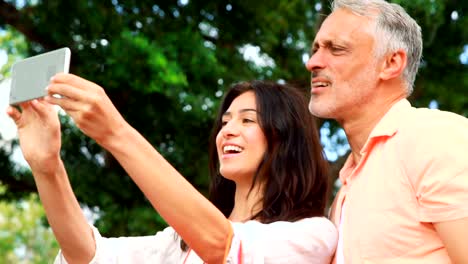 Smiling-couple-taking-selfie