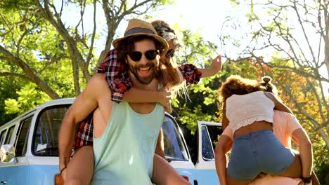 Hipster-boys-carrying-girls-on-their-shoulders