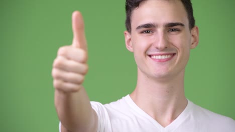 Young-handsome-man-giving-thumbs-up