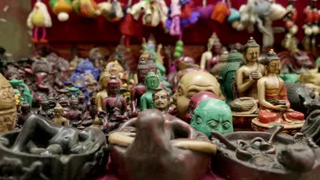 Colorful-tradition-wooden-handicrafts-on-sale-at-shop-in-Kathmandu,-Nepal.