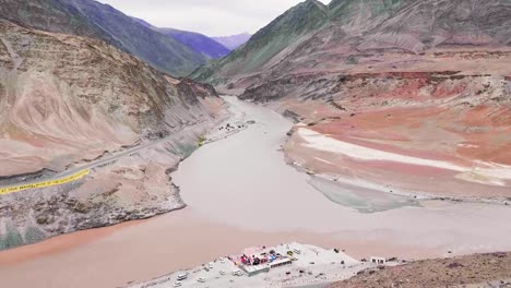 Confluence-of-the-Indus-and-Zanskar-Rivers,-two-different-colors-rivers-of-Indus-and-Zanskar-Rivers-in-Leh,-Ladakh,-India.