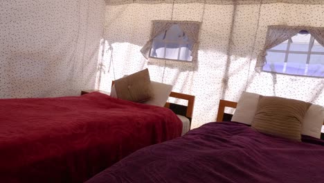 Inside-of-a-large-tent-with-bed-for-tourist-at-Pangong-Tso,-Ladakh,-India.