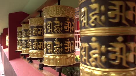 Some-Tibetan-prayer-wheels-are-turning-in-a-Buddhist-temple-in-India.