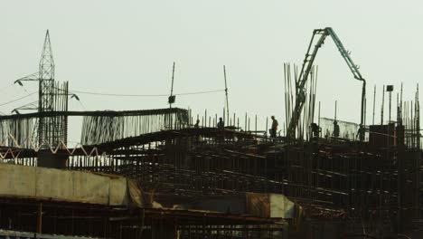 Time-Lapse-shot-of-manual-workers-working-at-a-construction-site