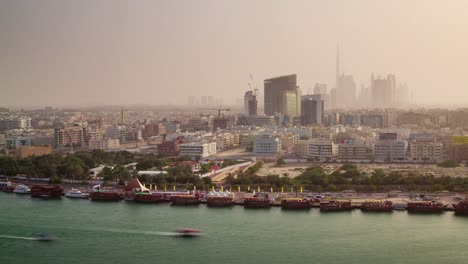 Dubai-Stadt-Sonnenuntergang-downtown-Deira-Dach-Top-Creek-Panorama-4-k-Zeit-verfallen-Vereinigte-Arabische-Emirate