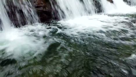 Close-Up-Of-Beautiful-Waterfall--4K-Tilt-Shot