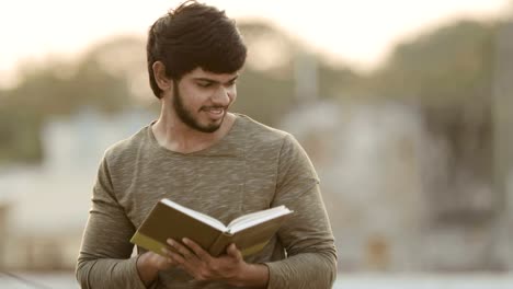 Young-man-reading-book