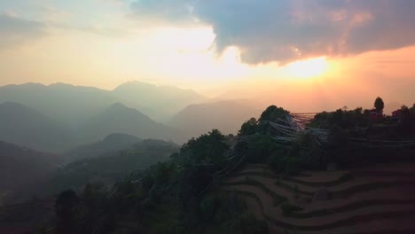 Sunset-above-valley-in-the-Himalaya-mountains,-Nepal