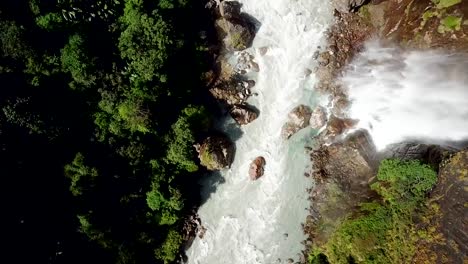 Waterfall-in-Himalayas-range-Nepal-from-Air-view-from-drone