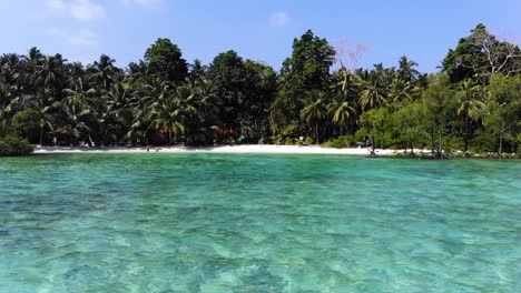 Crystal-clear-blue-water-of-a-Havelock-island-beach,-Andaman-and-Nicobar-islands