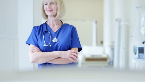 Portrait-of-Caucasian-female-hospital-nurse-wearing-scrubs