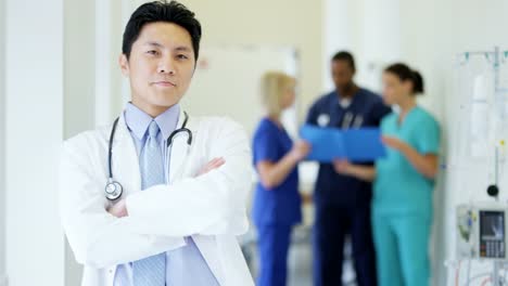 Portrait-of-confident-Chinese-American-male-hospital-doctor