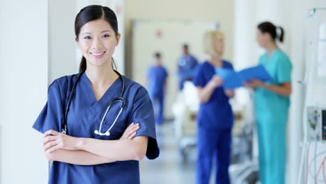 Portrait-of-professional-Asian-American-female-hospital-staff