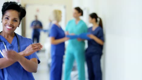 Portrait-of-African-American-female-nurse-in-corridor