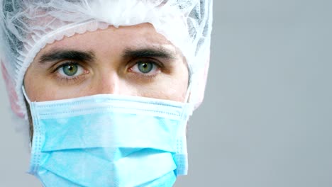 Portrait-of-a-physician-or-surgeon-who-looks-proud-room,-happy-and-smiling-for-his-work-in-the-clinic-or-hospital.