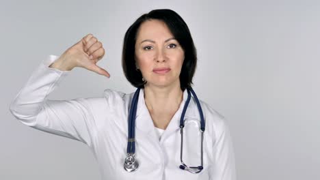 Portrait-of-Lady-Doctor-Gesturing-Thumbs-Down