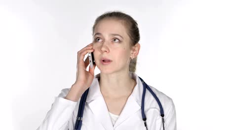 Young-Lady-Doctor-Talking-on-Smartphone,-White-Background