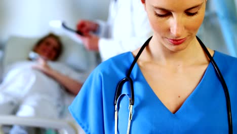 Portrait-of-female-doctor-using-digital-tablet-in-hospital