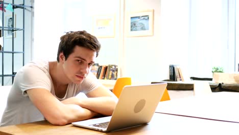 Tired-Sleeping-Man-on-Desk