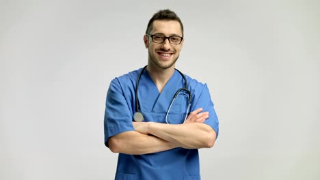 Doctor-folding-his-arms-and-smiling