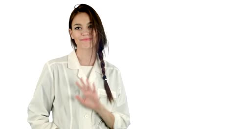 Smiling-young-woman-in-lab-coat-making-funny-dance-on-white-background