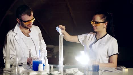 Two-scientists-are-working-in-laboratory.