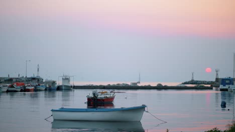 Harbour-with-tied-up-boats,-view-in-the-evening