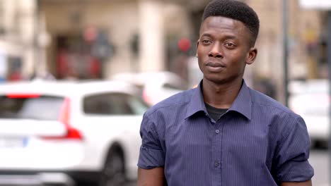 handsome-young-african-american-man-observing-the-city