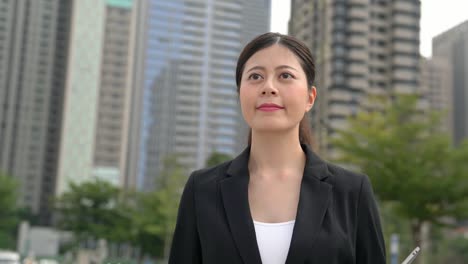 business-woman-walking-on-the-urban-street