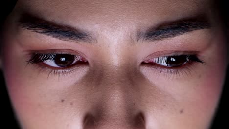 Close-up-on-woman's-eyes-at-night.