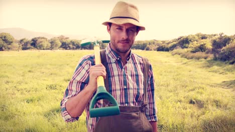 Happy-farmer-hält-eine-Schaufel