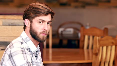 Handsome-man-using-his-laptop-computer