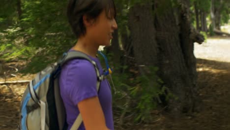 Cute-girl-walks-through-the-forest