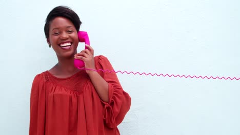 Happy-woman-with-beautiful-smile-talking-on-the-phone