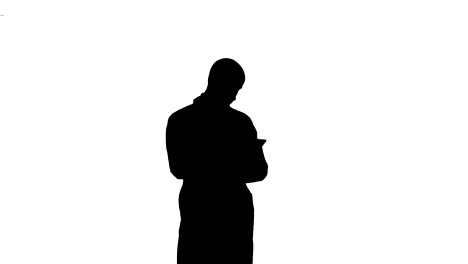 Silhouette-Male-doctor-using-digital-tablet