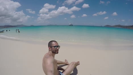 Man-taking-a-selfie-in-Whitsunday,-Australia