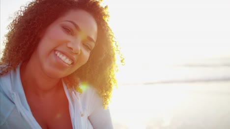 Portrait-of-Ethnic-female-on-vacation-at-sunrise