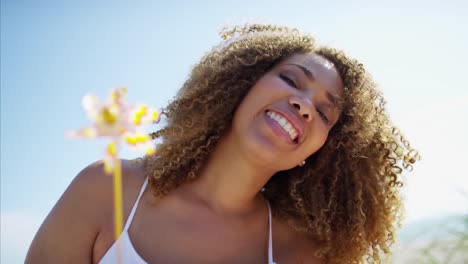 Portrait-of-voluptuous-Ethnic-female-enjoying-summer-fun