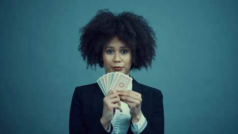 black-woman-with-a-deck-of-cards-covering-her-face