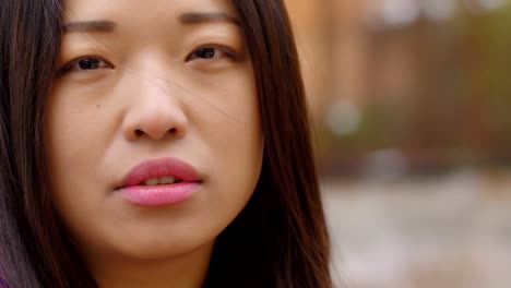 Chinese-Woman-Portrait:-Thoughtful-Young-Asian-Woman-Looking-In-Camera