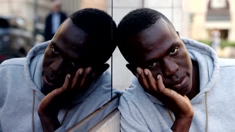 depressed-sad-black-african-man-looking-in-camera-outdoor