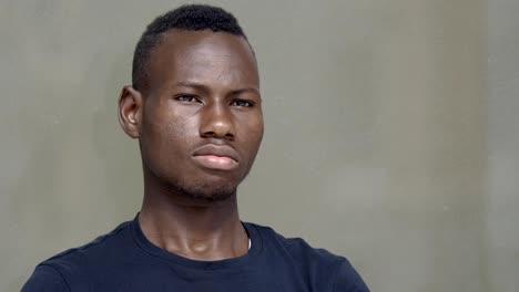 portait-of-Young-balck-african--smiling-at-camera