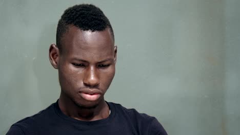 Thoughtful-depressed-young-black-african-man---portrait