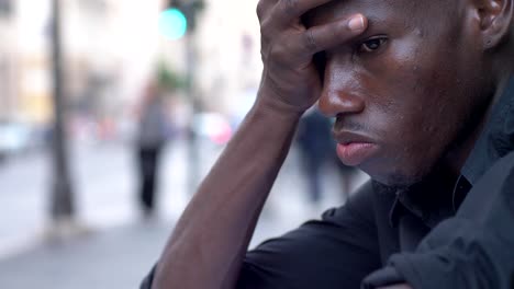 Worried-thoughtful-young-black-man-thinking.-Finding-solution--outdoor