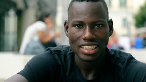 close-up-on-attractive-young--african-man-smiling-at-camera